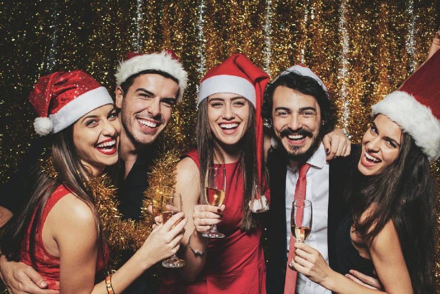 Adults having fun at a Holiday Party at Surge Entertainment